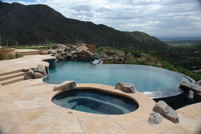 Curved pool and hot tub built by Cimarron Circle Construction